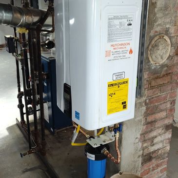 Tankless water heater. Navien, AO Smith. 