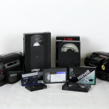Image of Videotapes, Camcorder Tapes, VHS Tapes, MiniDV Tapes, and Camcorders.
