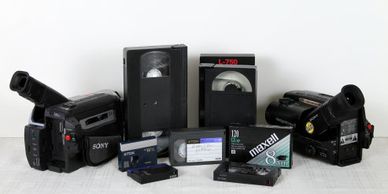 Image of Camcorders, VHS Tapes, Camcorder Tapes, 8mm Tapes, and MiniDV Tapes.
