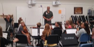 Leading the high school orchestra