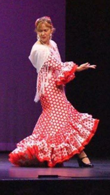 Adult student performing on stage "Solea", a Flamenco piece