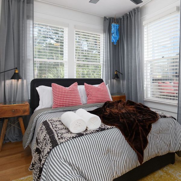 Second bedroom featuring cozy bedding and a peaceful atmosphere for unwinding.