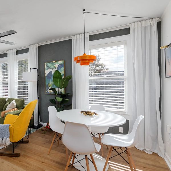 Open-concept living and dining area designed for comfort, connection, and easy living.