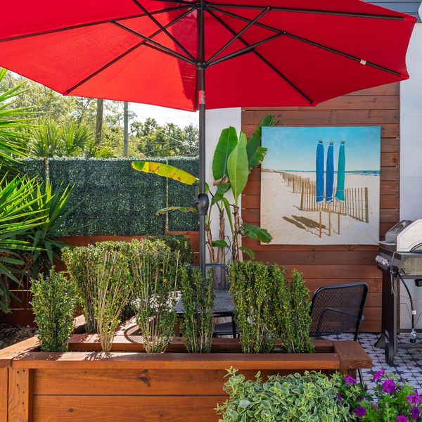 Unwind outside after a beach day, grill, relax, and enjoy the coastal breeze.