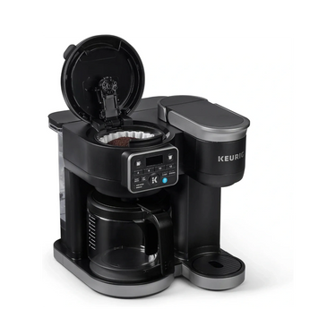 Keurig coffee maker with dual brewing options and a glass carafe.