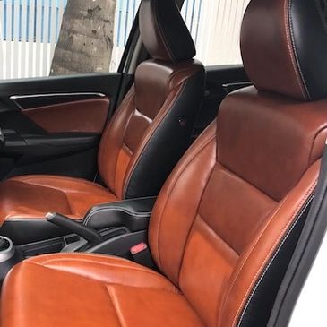 custom seats in saddle leather on full seats