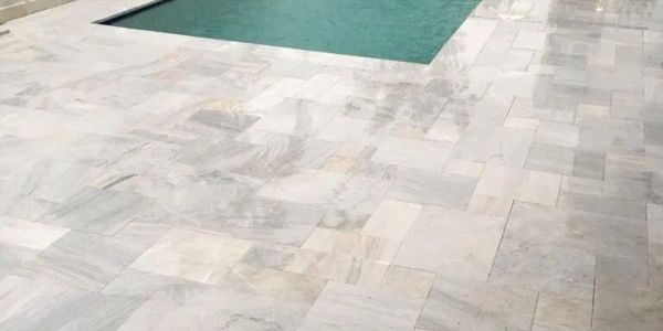 Marble floor with a small pool.