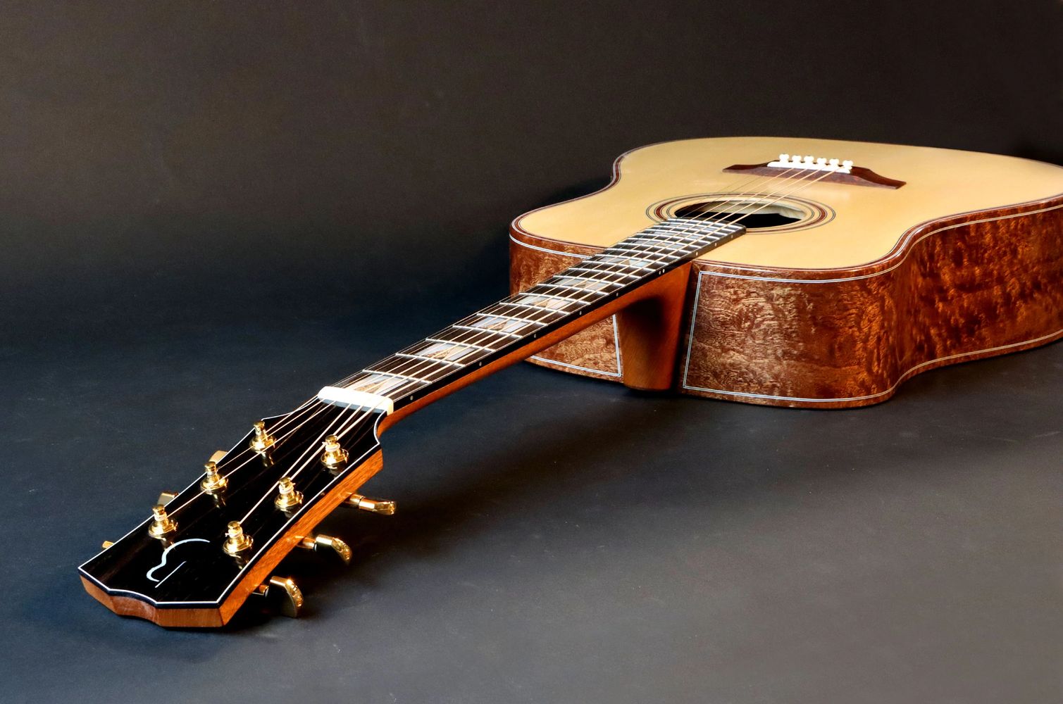 Hand made guitar with pomel sapele back and sides.