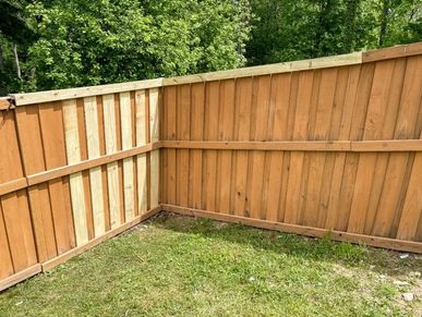Pressure-treated wood fence repairs in Pittsburgh