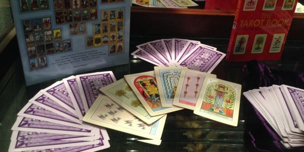 Tarot cards, oracle decks, books and cheat-sheets.