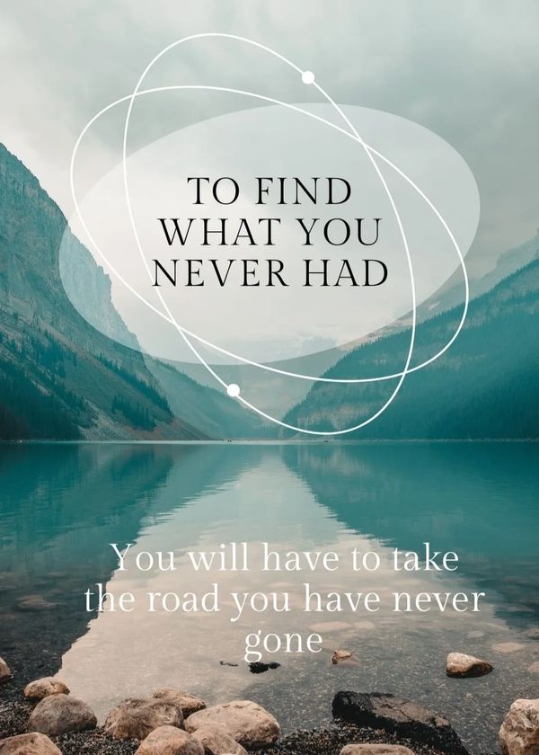 Motivational quote over a serene lake with mountains background.
