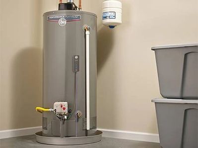 A modern water heater installed in a clean utility room.