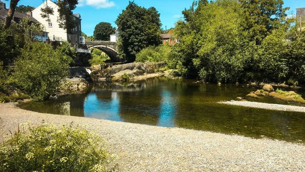 Scenic River Wye at Rhayader, Wales – tranquil riverside spot near glamping pods and nature walks
