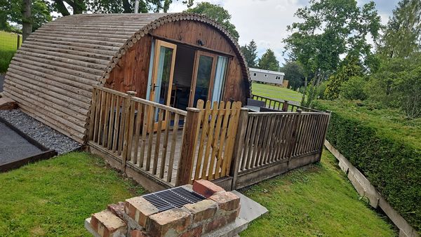 Cosy glamping pod with gated deck and BBQ near river in Powys, Builth Wells, Wales. country views