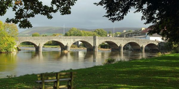 Historic bridge over River Wye in Builth Wells, Powys – scenic spot nr riverside glamping pods wales