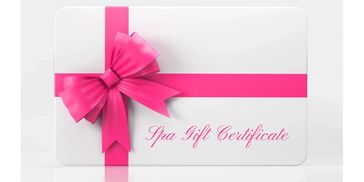 Elegant spa gift certificate with a pink ribbon and bow.