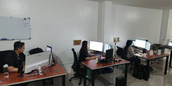 Busy day at Global International Services Inc. satellite office in the Philippines