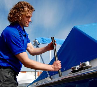 INVENTOR DAVID SMITH INSTALLS NEVR-SPILL INTHE DECK FUEL FILL