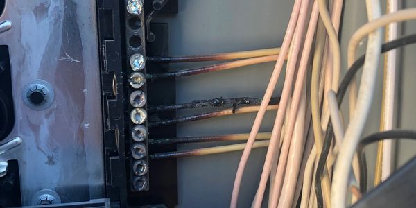Neutral wire not properly landed to neutral bar causes a lot of heat and can damage your electrical panel and wiring