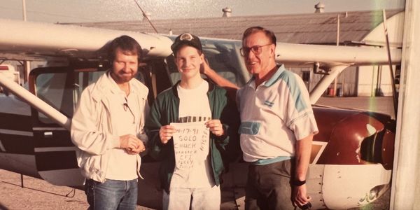 My 16th Birthday, soloed prior to getting my driver's license. That's my dad with the beard, who pas