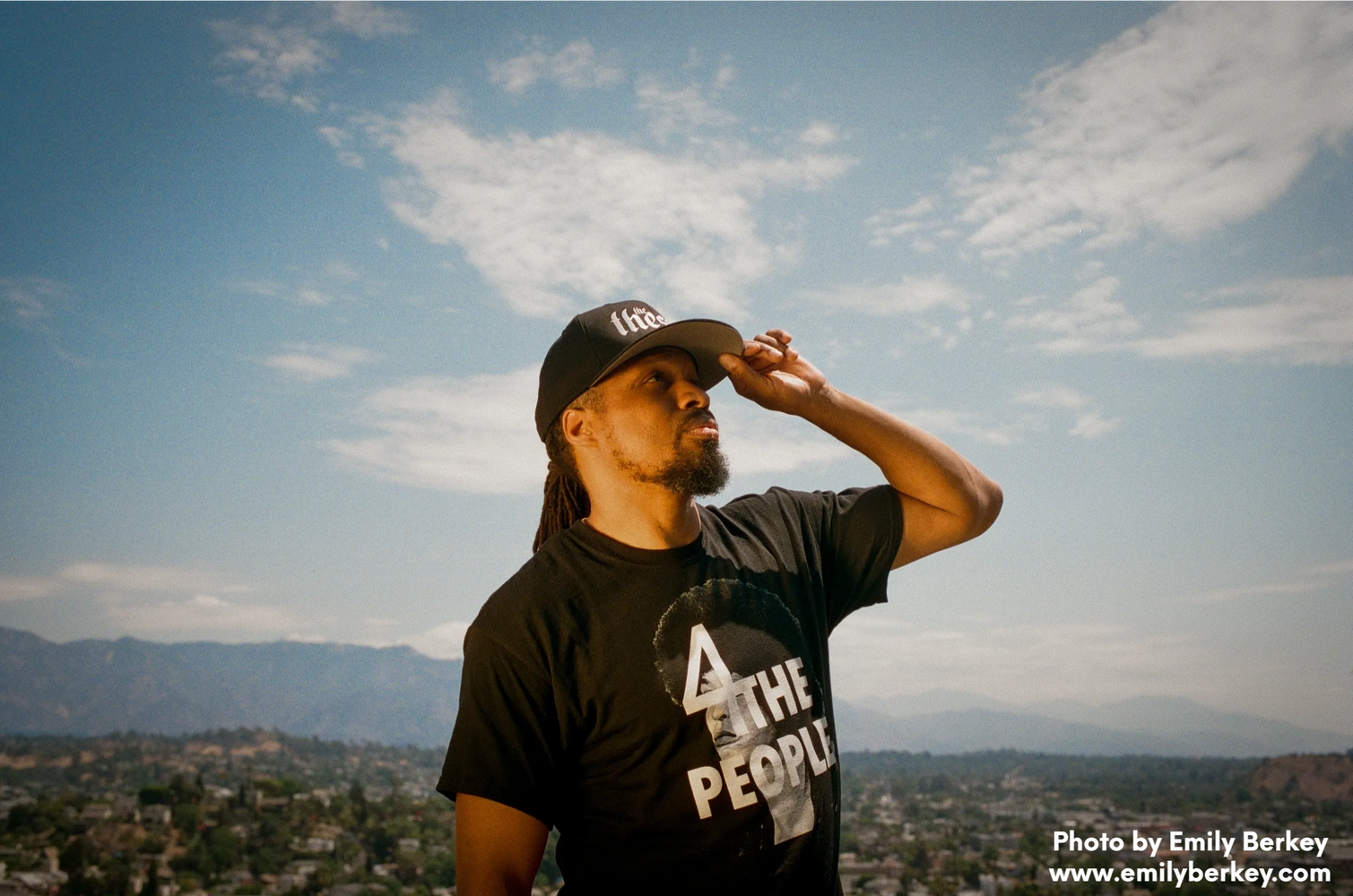 Image of Mac on Mt Washington, overlooking the City.

Photo by Emily Berkey