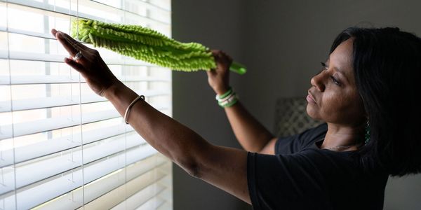 cleaning blinds in a home