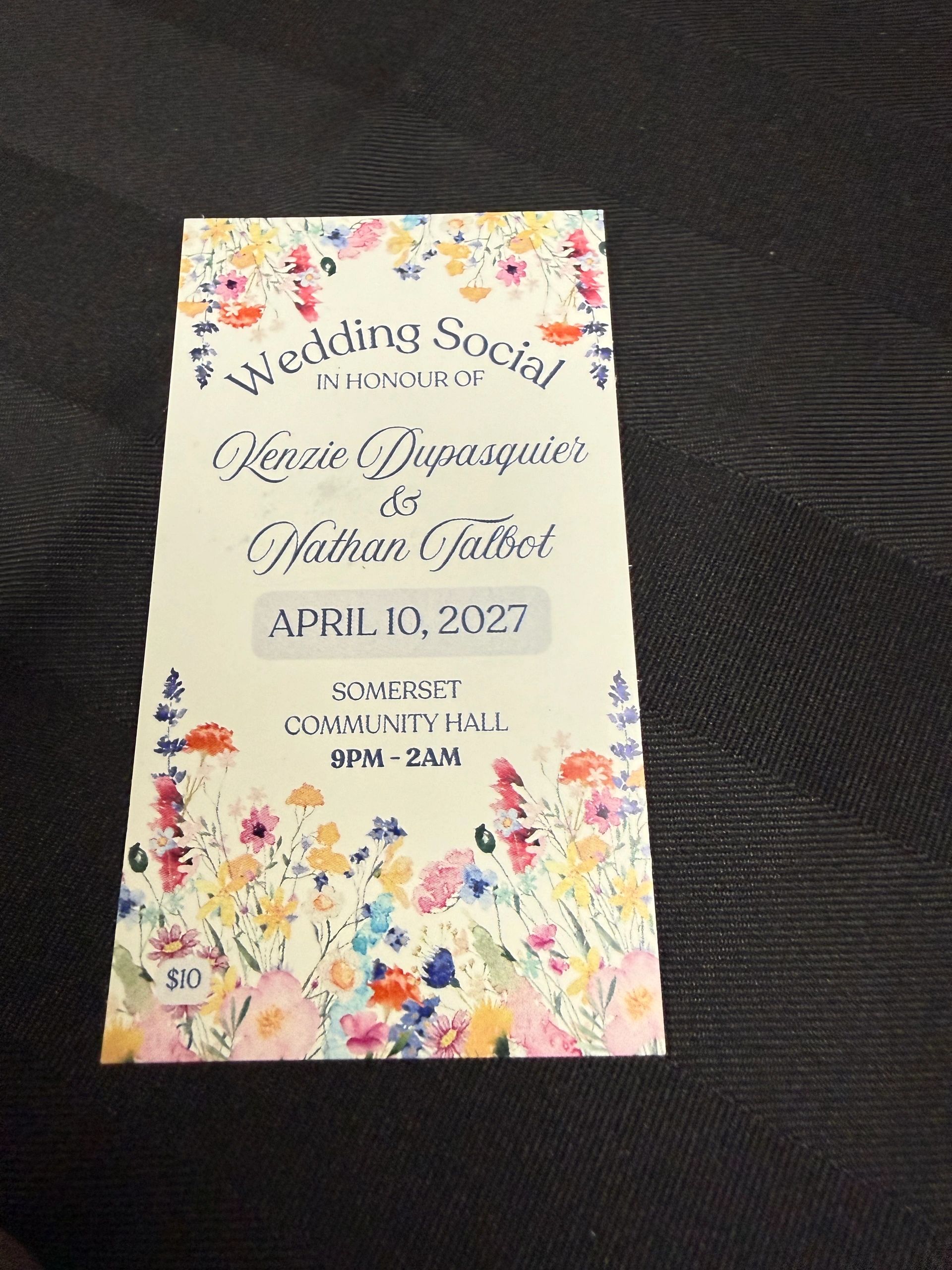 Wedding social invitation with floral design and event details.