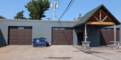 Front entrance with heated stamped concrete and overhang. 