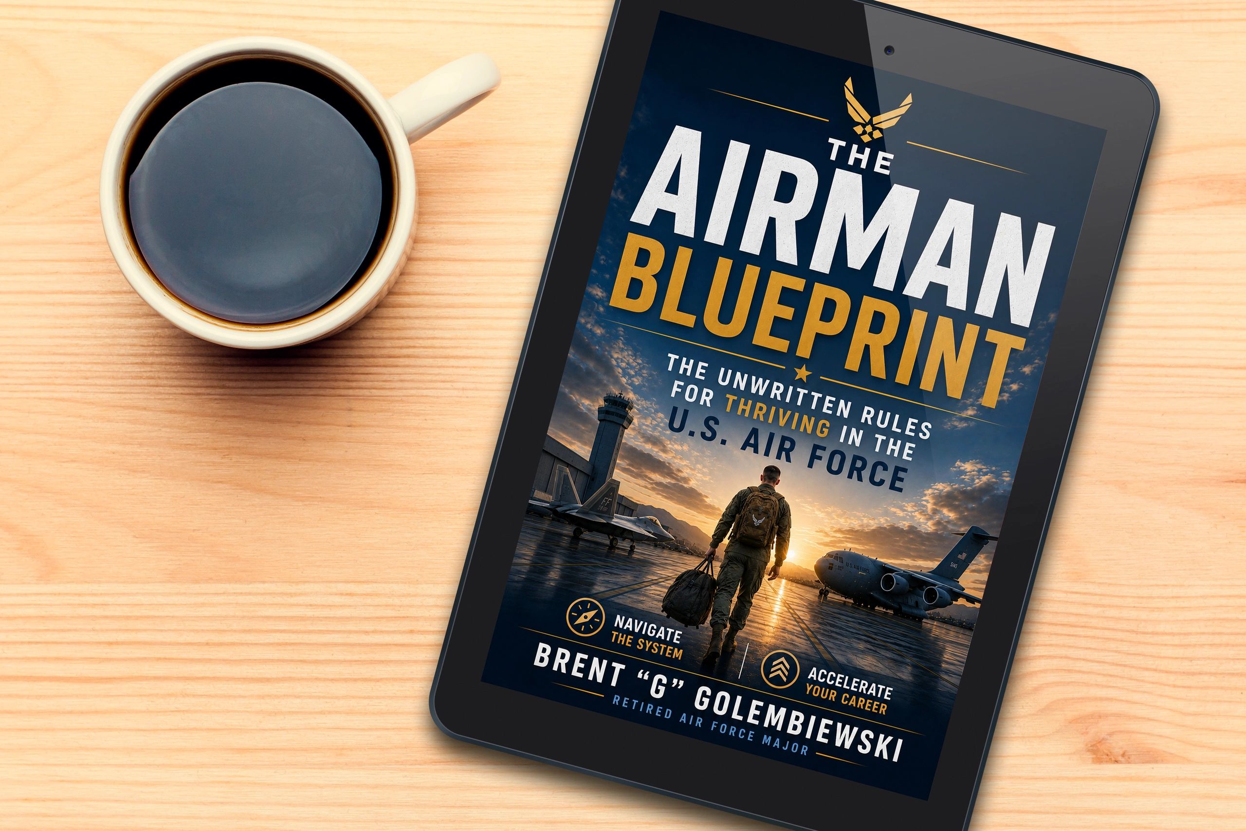 Tablet displaying "The Airman Blueprint" book cover next to a cup of coffee.