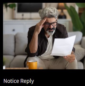 Man looking stressed while reading a letter.