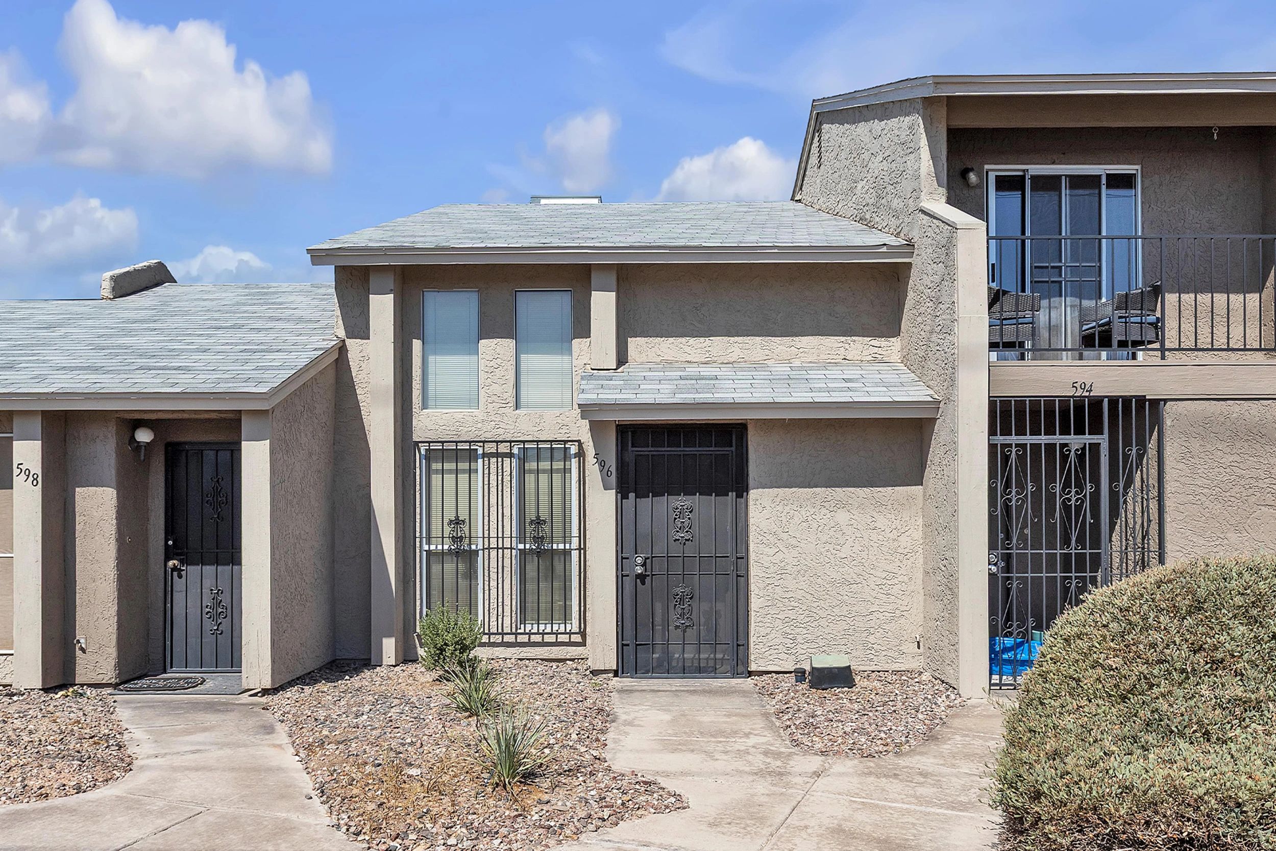 Front door with oversized windows