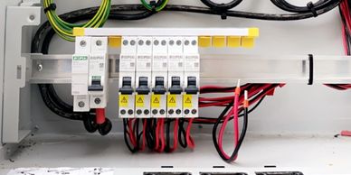 Electrical circuit breakers inside a panel.