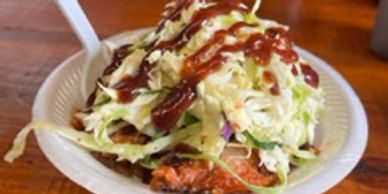 BBQ plate with meat, beans, and coleslaw