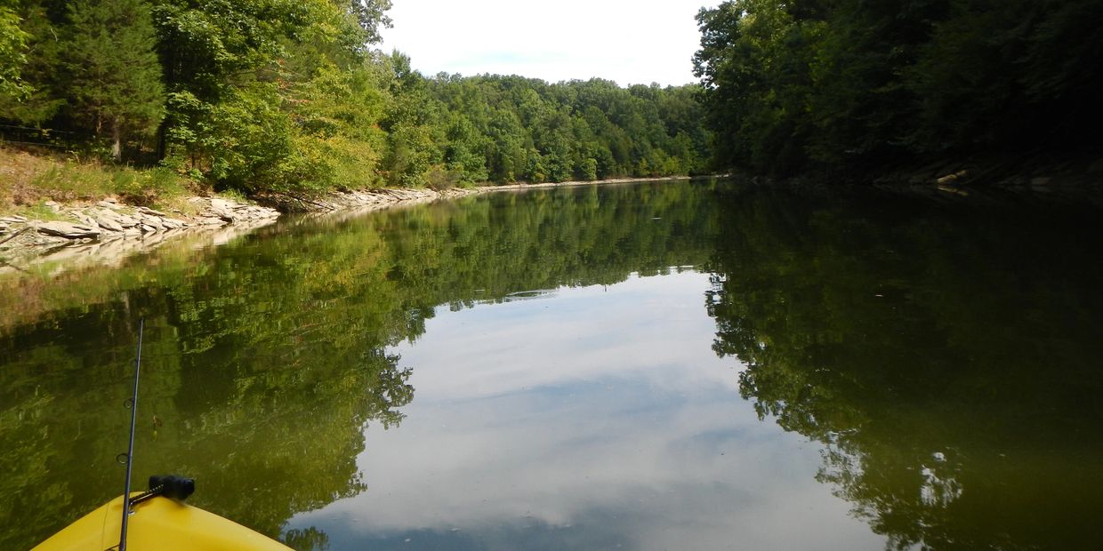 lake with kayak in foreground