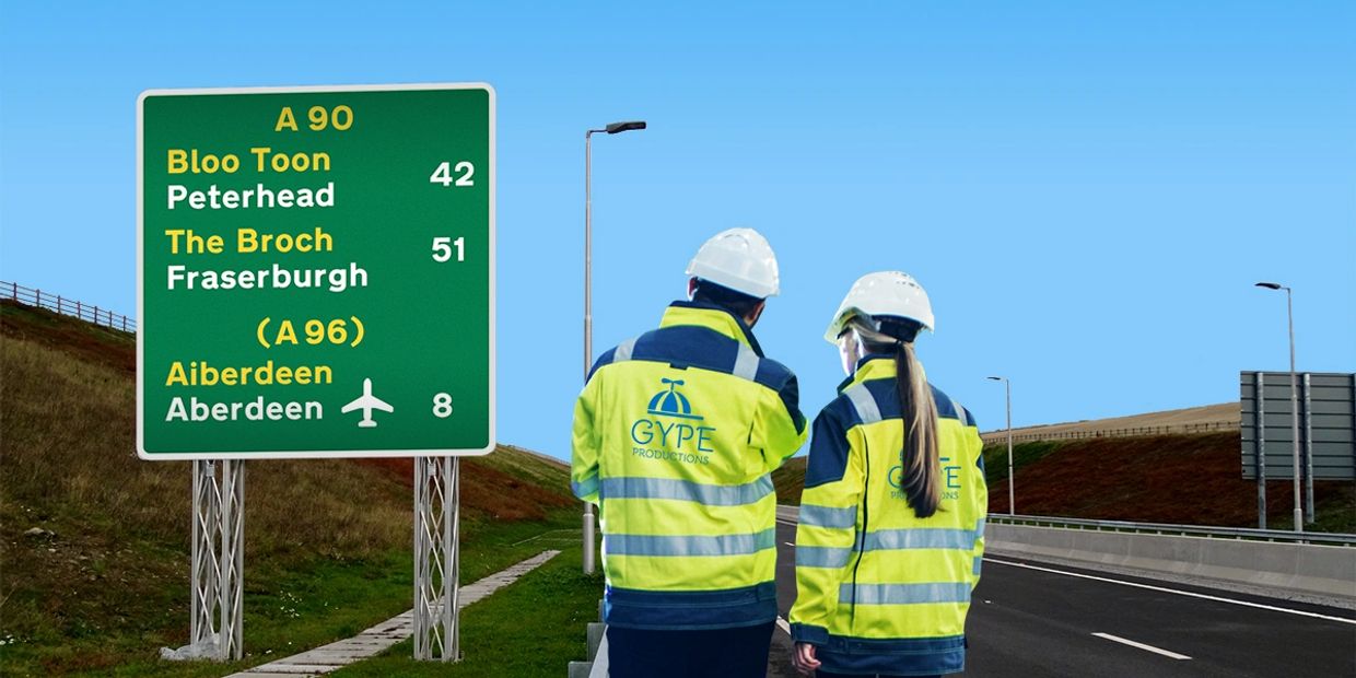 Doric bilingual road signage being installed by Gype Production engineers
