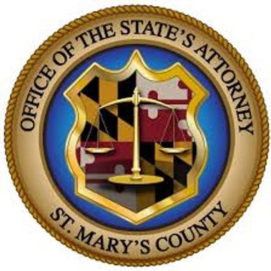 Official seal with scales and Maryland flag.