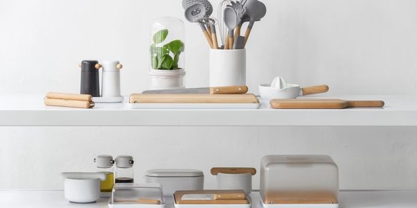 random kitchenware on two shelves. 