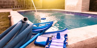 Pool with accessories on the side. 