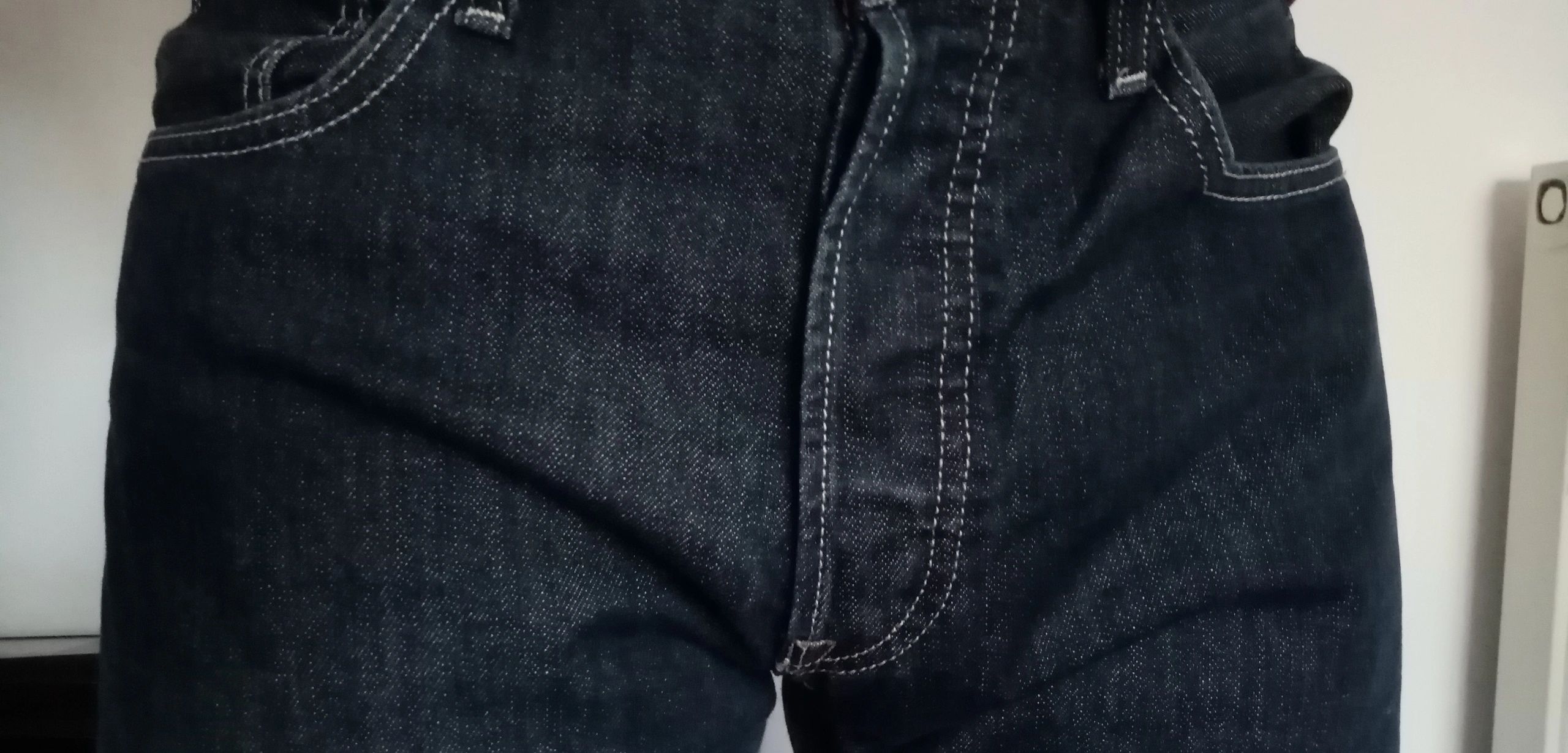 James' at SkinMap's crotch in blue jeans