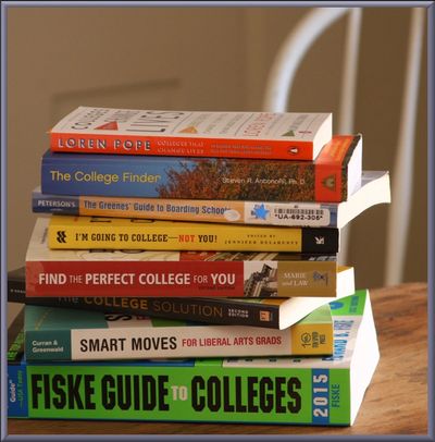 Stack of various college and school guidebooks.