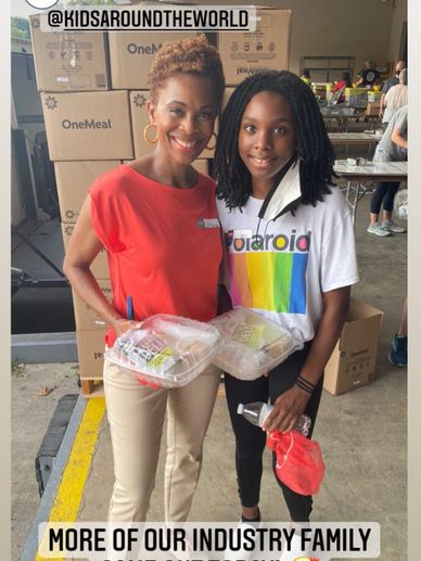 Valonda and Lilyn Calloway standing in warehouse. 