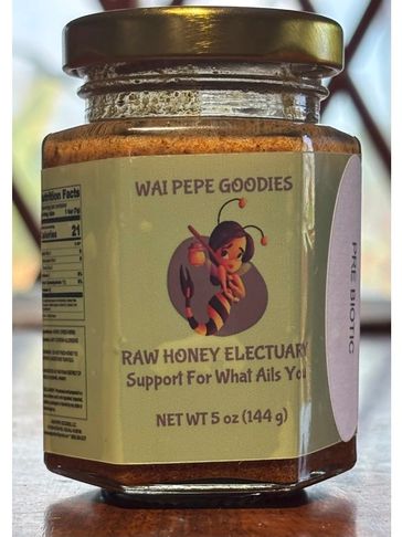 Jar of Wai Pepe Goodies Raw Honey Electuary with a bee mascot.
