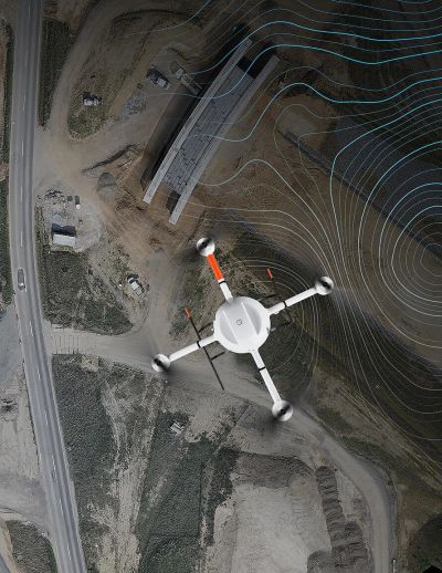 Drone flying above a construction site with topographic lines.