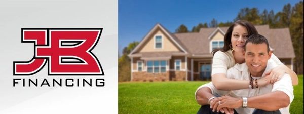 Happy couple in front of their new home with JB Financing logo.