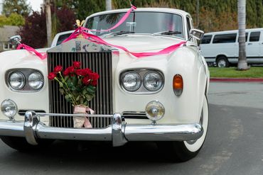 Vintage Rolls Royce Limo & Car Services from Antique Limousine: Front View with Roses in the Grille