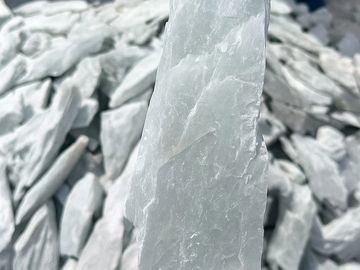 Close-up of a white translucent mineral crystal.