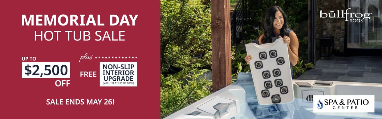 Woman holding a jetpak on a memorial day promotion for bullfrog spas
