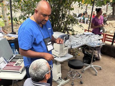 Optometrist evaluates patient's vision