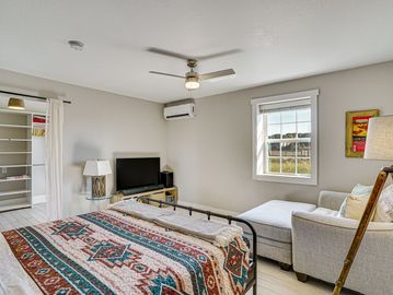 Bedroom with SmartTv and oversize chair