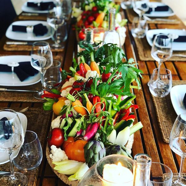 Table decoration using crudités for lunch at a private villa in France 